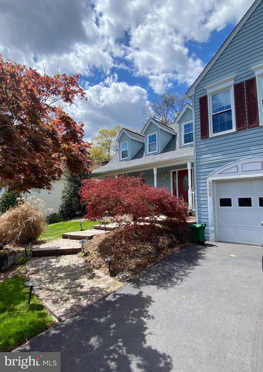 8806 Cardinal Ct, Laurel, MD 20723 - view of property exterior with a garage and driveway