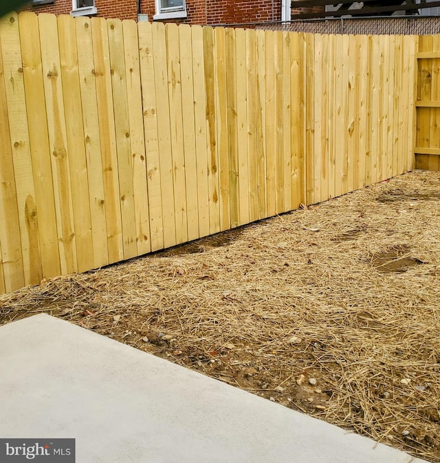 view of yard with a patio and fence