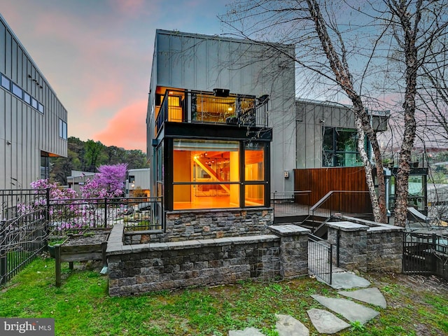 3411 Woodberry Ave, Baltimore, MD 21211 - back of house featuring fence and a balcony