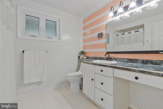 305 W Poplar Rd, Sterling, VA 20164 - bathroom with tile patterned floors, toilet, baseboards, a shower with shower curtain, and vanity