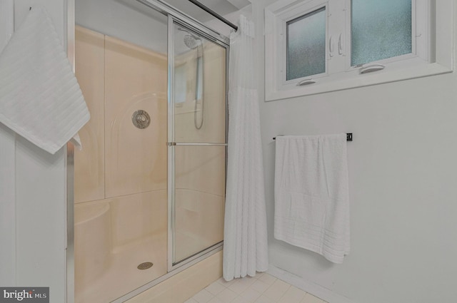 305 W Poplar Rd, Sterling, VA 20164 - full bath featuring a shower stall and tile patterned flooring