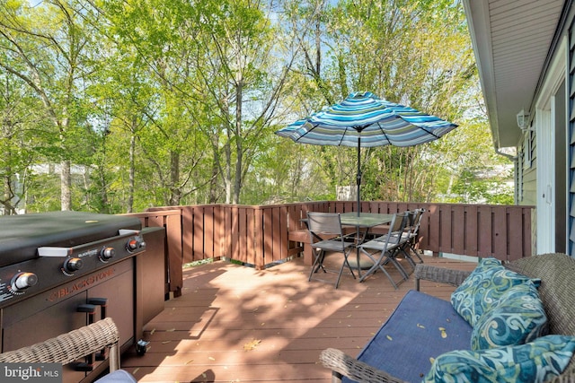 305 W Poplar Rd, Sterling, VA 20164 - wooden deck with outdoor dining area and grilling area