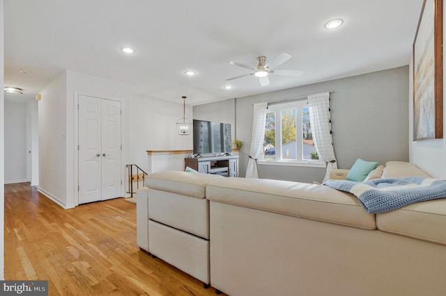 305 W Poplar Rd, Sterling, VA 20164 - living area featuring recessed lighting, light wood-type flooring, baseboards, and ceiling fan