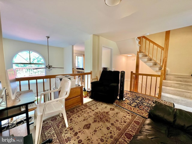 interior space with a ceiling fan