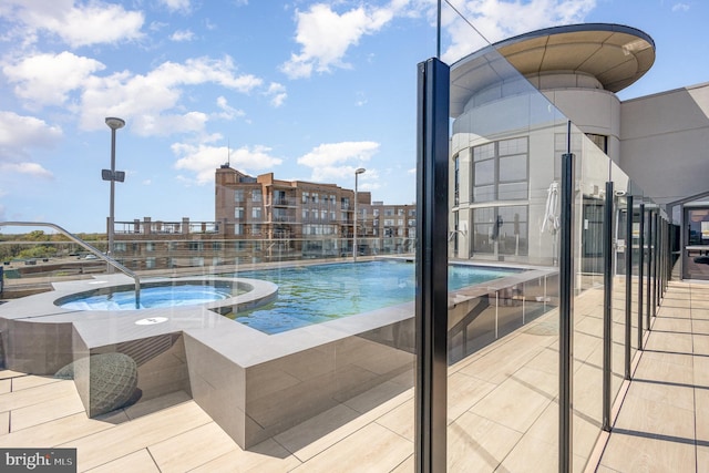 pool with a hot tub