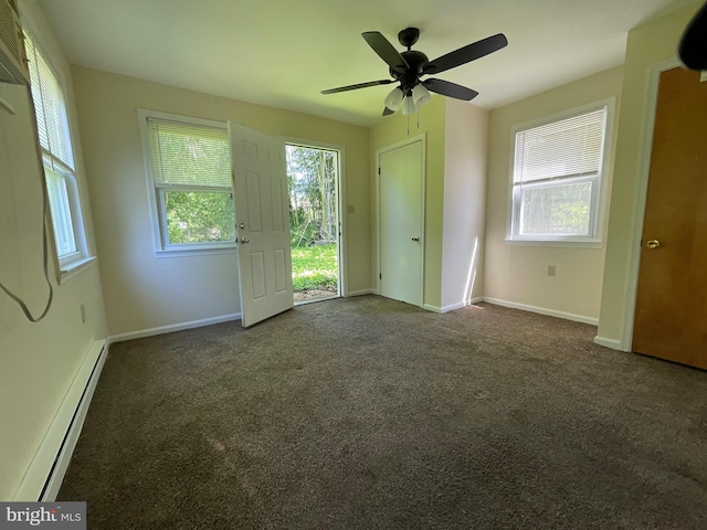 interior space featuring a baseboard radiator, a ceiling fan, carpet flooring, and baseboards