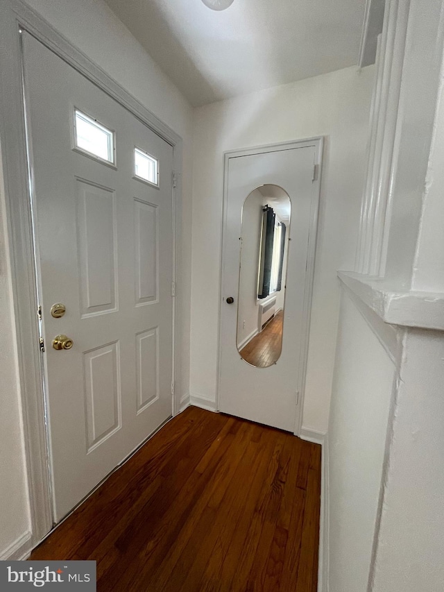 foyer entrance with wood finished floors