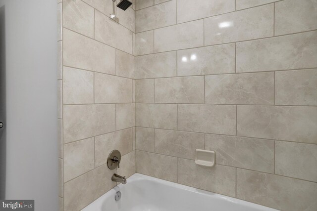 full bath with shower / tub combination