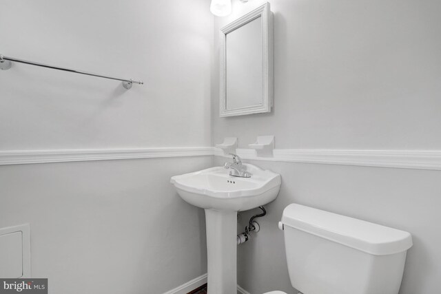 bathroom with a sink and toilet
