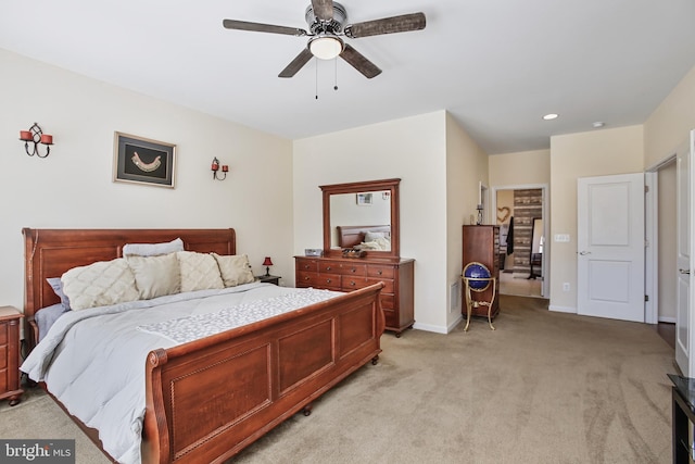 bedroom with light colored carpet, ceiling fan, baseboards, and recessed lighting