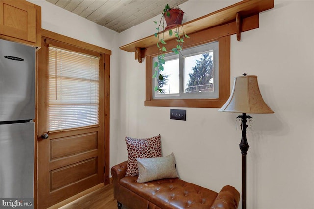 sitting room featuring wood finished floors