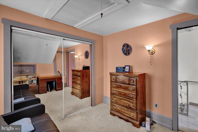 bedroom with carpet and lofted ceiling
