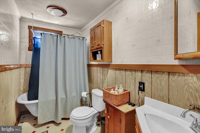 full bath with wooden walls, a shower with curtain, crown molding, toilet, and a bath