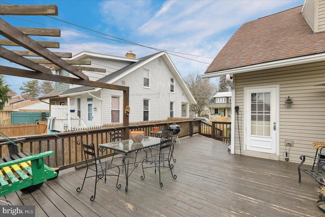 deck with outdoor dining space
