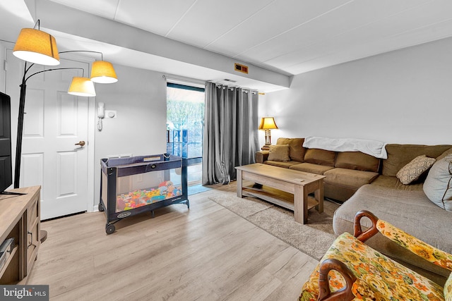 living room featuring light wood-style flooring