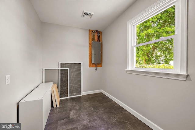 210 N Main St, Berlin, MD 21811 - interior space with baseboards, visible vents, plenty of natural light, and electric panel