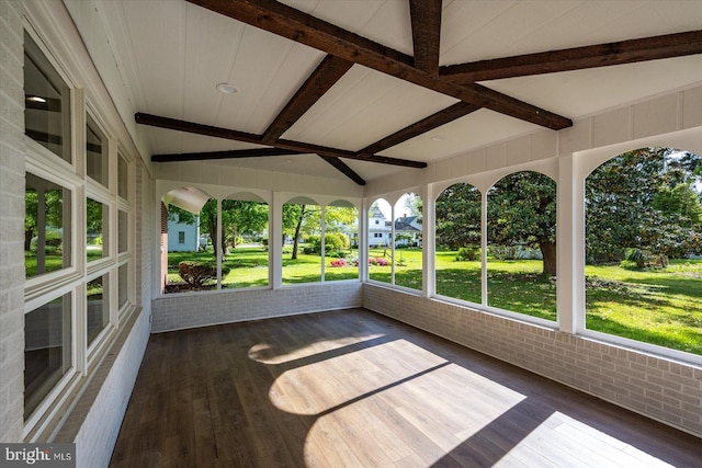 210 N Main St, Berlin, MD 21811 - unfurnished sunroom featuring beamed ceiling, brick wall, and wood finished floors