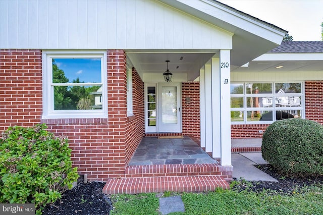 210 N Main St, Berlin, MD 21811 - property entrance featuring brick siding