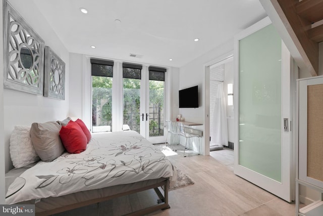 bedroom featuring access to outside, recessed lighting, ensuite bath, and visible vents