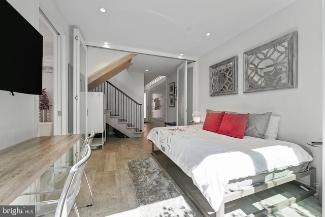 bedroom with recessed lighting