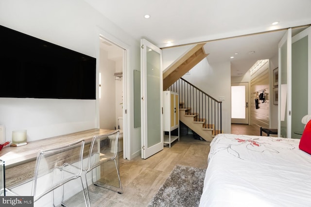 bedroom featuring recessed lighting