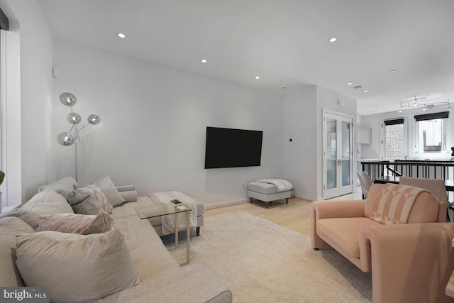 living area featuring recessed lighting and light wood-type flooring