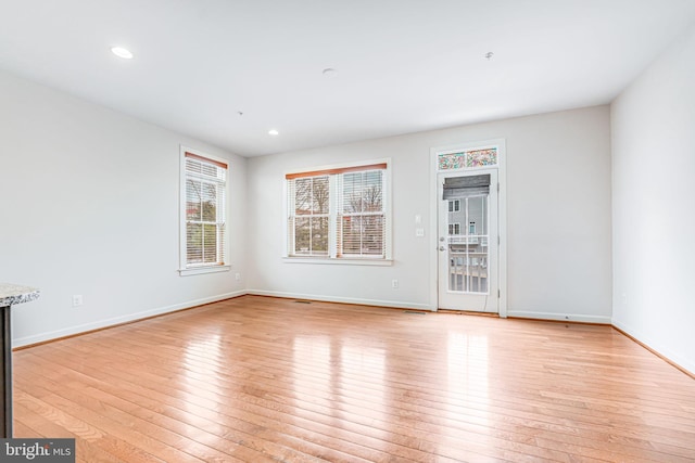 11350 Ridgeline Rd, Fairfax, VA 22030 - empty room with recessed lighting, light wood-style floors, and baseboards
