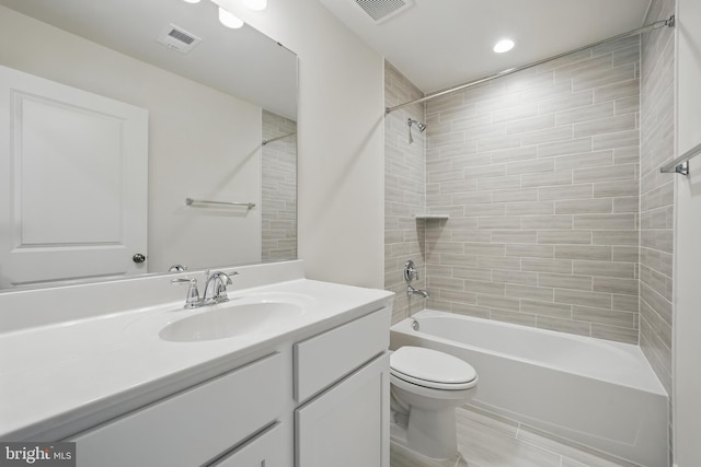 8504 Wendy St, Clinton, MD 20735 - bathroom with toilet, vanity, shower / tub combination, and recessed lighting
