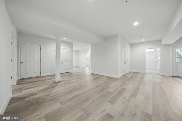 8504 Wendy St, Clinton, MD 20735 - unfurnished living room featuring baseboards, recessed lighting, and light wood-type flooring