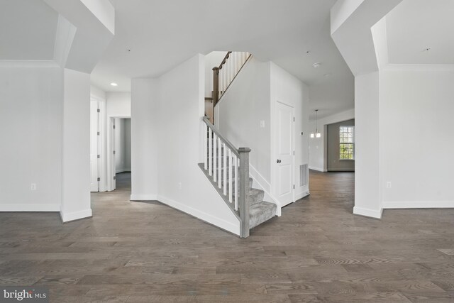 8504 Wendy St, Clinton, MD 20735 - staircase featuring baseboards, wood finished floors, and recessed lighting