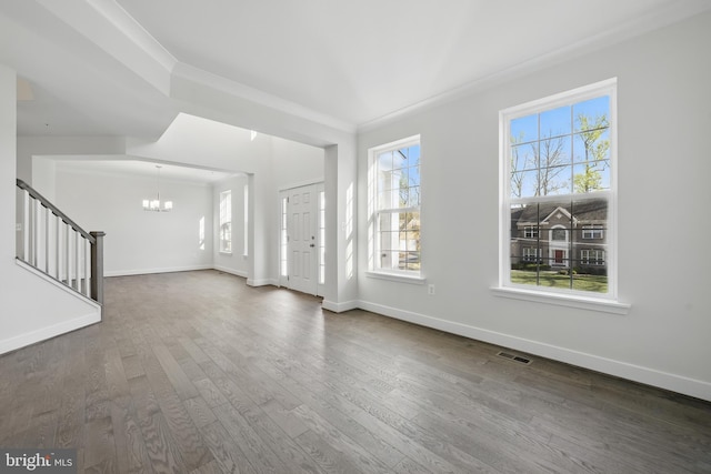 8504 Wendy St, Clinton, MD 20735 - entryway with stairs, wood finished floors, a chandelier, baseboards, and ornamental molding
