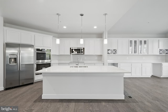 8504 Wendy St, Clinton, MD 20735 - kitchen with stainless steel appliances, a sink, white cabinets, a center island with sink, and recessed lighting
