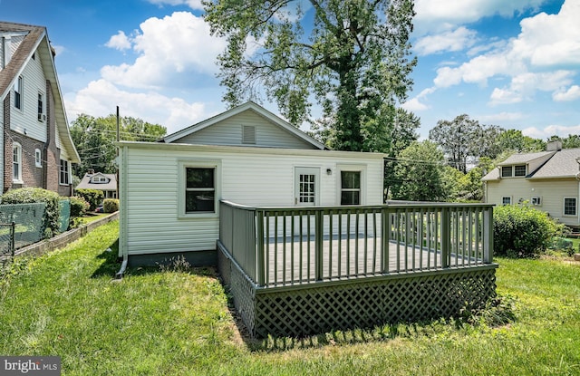 603 Hillcrest Ave, Wilmington, DE 19809 - rear view of property featuring a yard and a deck