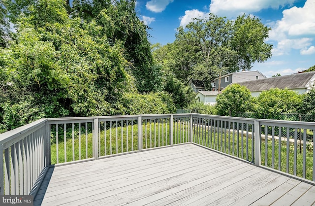 603 Hillcrest Ave, Wilmington, DE 19809 - wooden deck featuring a lawn