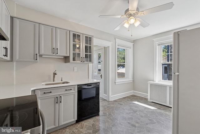 33 S Brighton Ave, Upper Darby, PA 19082 - kitchen with freestanding refrigerator, stone floors, black dishwasher, electric range oven, and a sink
