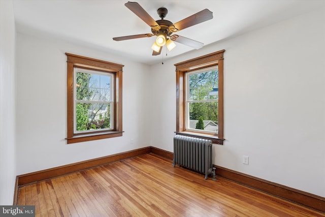 33 S Brighton Ave, Upper Darby, PA 19082 - spare room featuring baseboards, plenty of natural light, light wood-style flooring, and radiator