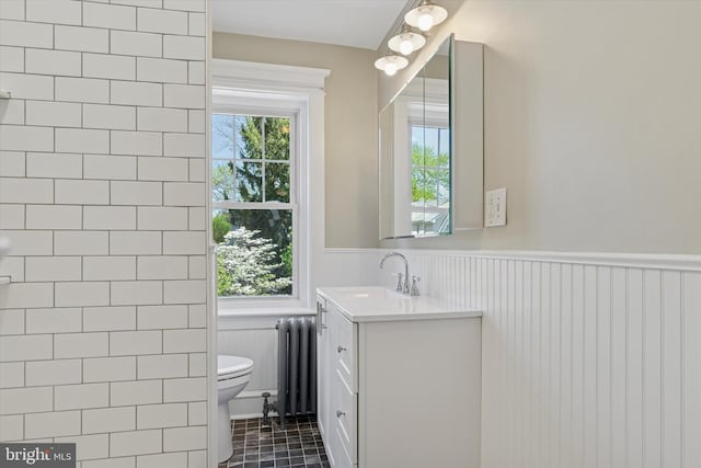 33 S Brighton Ave, Upper Darby, PA 19082 - bathroom with toilet, wainscoting, radiator heating unit, and vanity