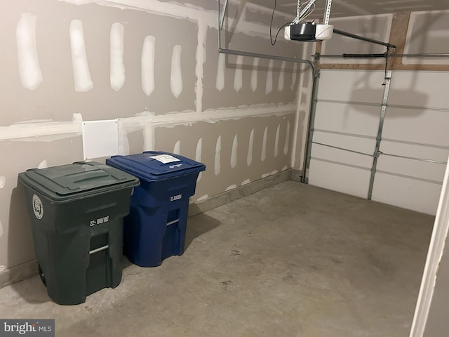 garage featuring a garage door opener