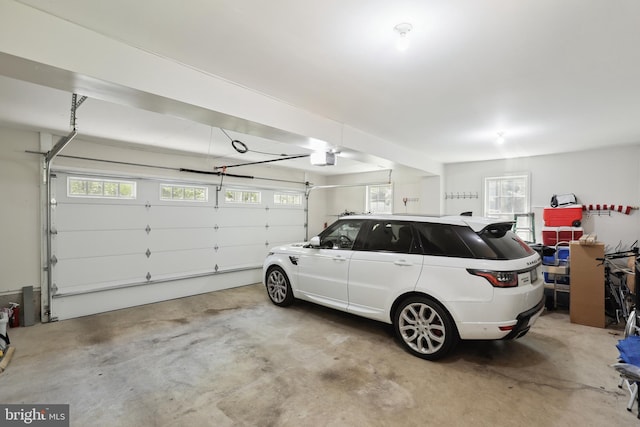 garage featuring a garage door opener