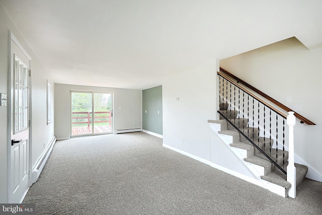 interior space featuring baseboard heating, baseboards, and carpet