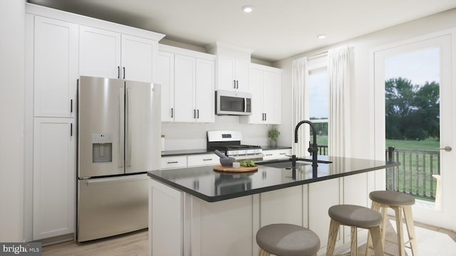 43290 Farringdon Sq, Broadlands, VA 20148 - kitchen with white fridge with ice dispenser, stove, stainless steel microwave, a sink, and dark countertops