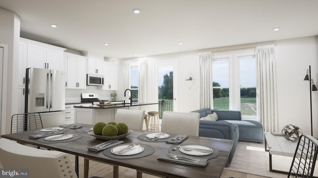 43290 Farringdon Sq, Broadlands, VA 20148 - dining room with recessed lighting and light wood-style floors