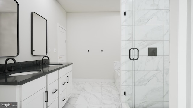43290 Farringdon Sq, Broadlands, VA 20148 - full bath with marble look tiles, double vanity, a shower stall, and baseboards