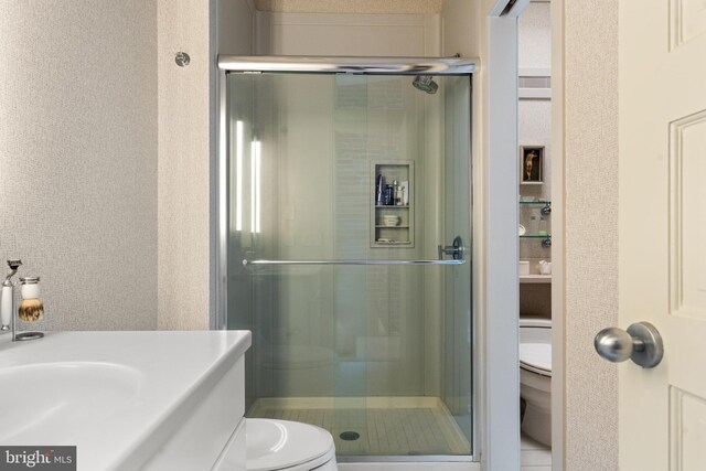 1910 Biltmore St NW Unit 2, Washington, DC 20009 - bathroom with toilet, a stall shower, and vanity