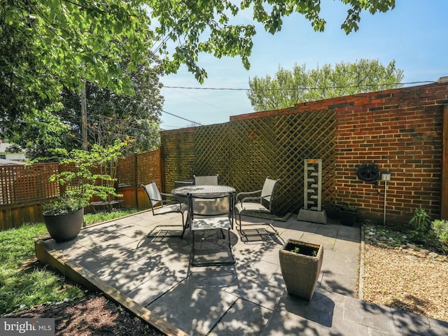 view of patio / terrace with fence and outdoor dining area