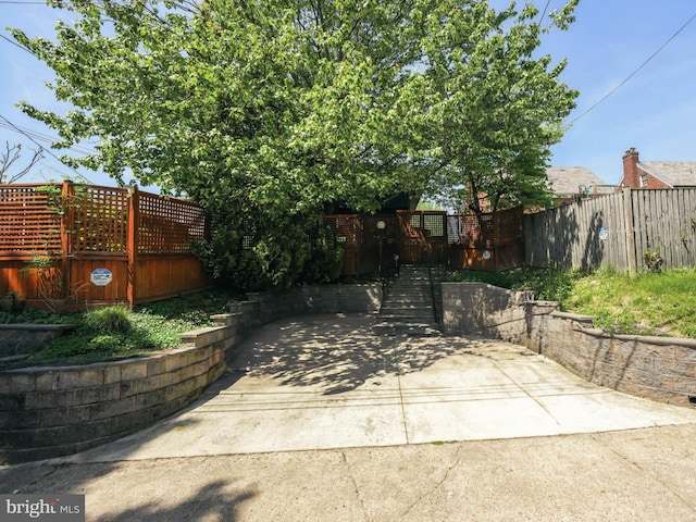 view of patio / terrace featuring fence