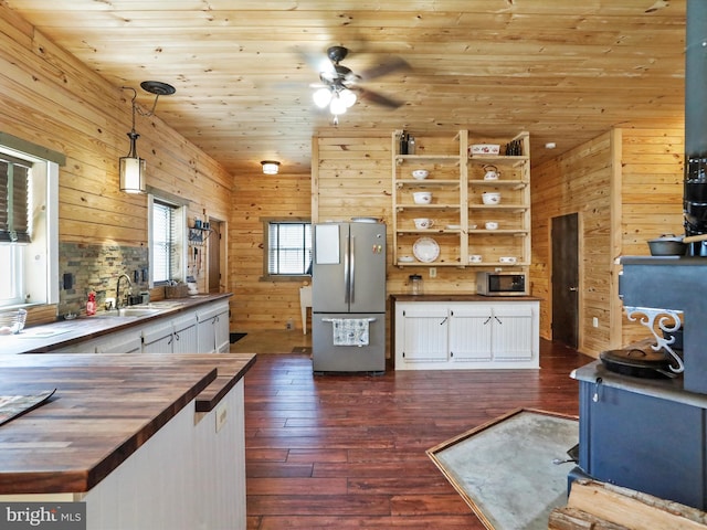 125 Rural Retreat Ln, Great Cacapon, WV 25422 - kitchen with appliances with stainless steel finishes, butcher block counters, a sink, dark wood-style floors, and wood ceiling