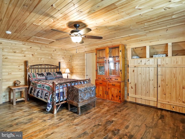 125 Rural Retreat Ln, Great Cacapon, WV 25422 - bedroom with wood ceiling, wooden walls, wood-type flooring, and ceiling fan