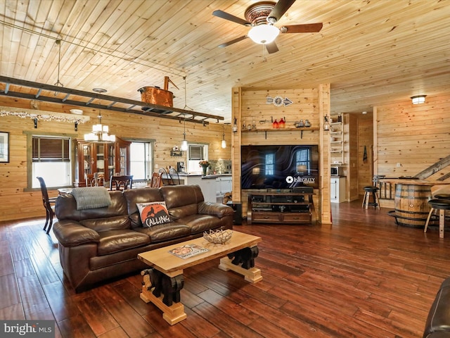 125 Rural Retreat Ln, Great Cacapon, WV 25422 - living area with wooden walls, wooden ceiling, wood-type flooring, a ceiling fan, and a chandelier