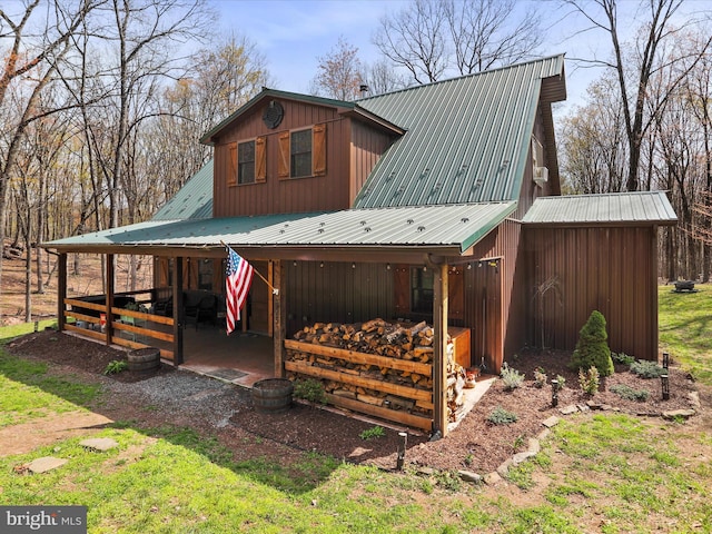 125 Rural Retreat Ln, Great Cacapon, WV 25422 - view of front of house with metal roof